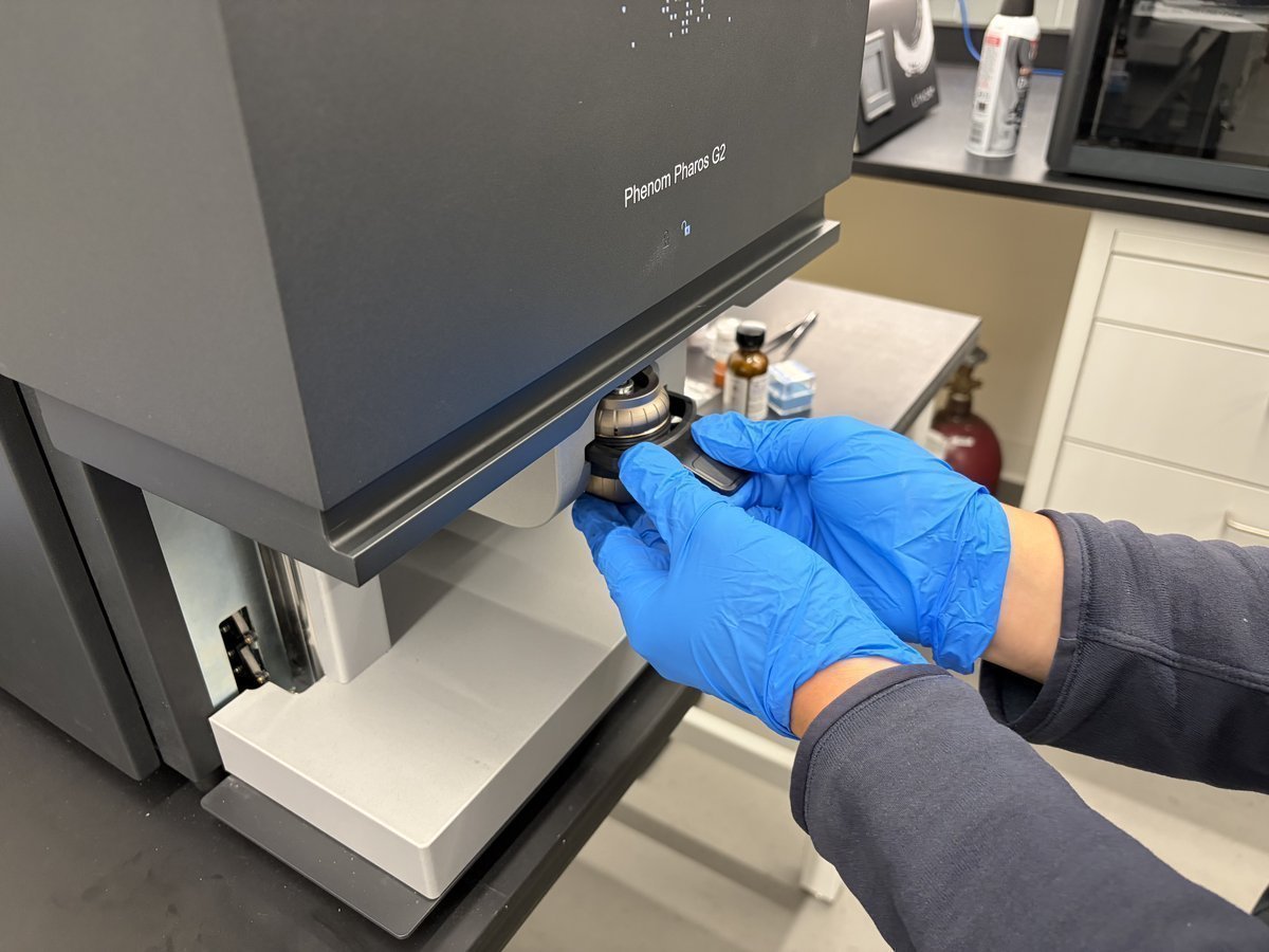 Previous sample stub holder seated inside the open drawer