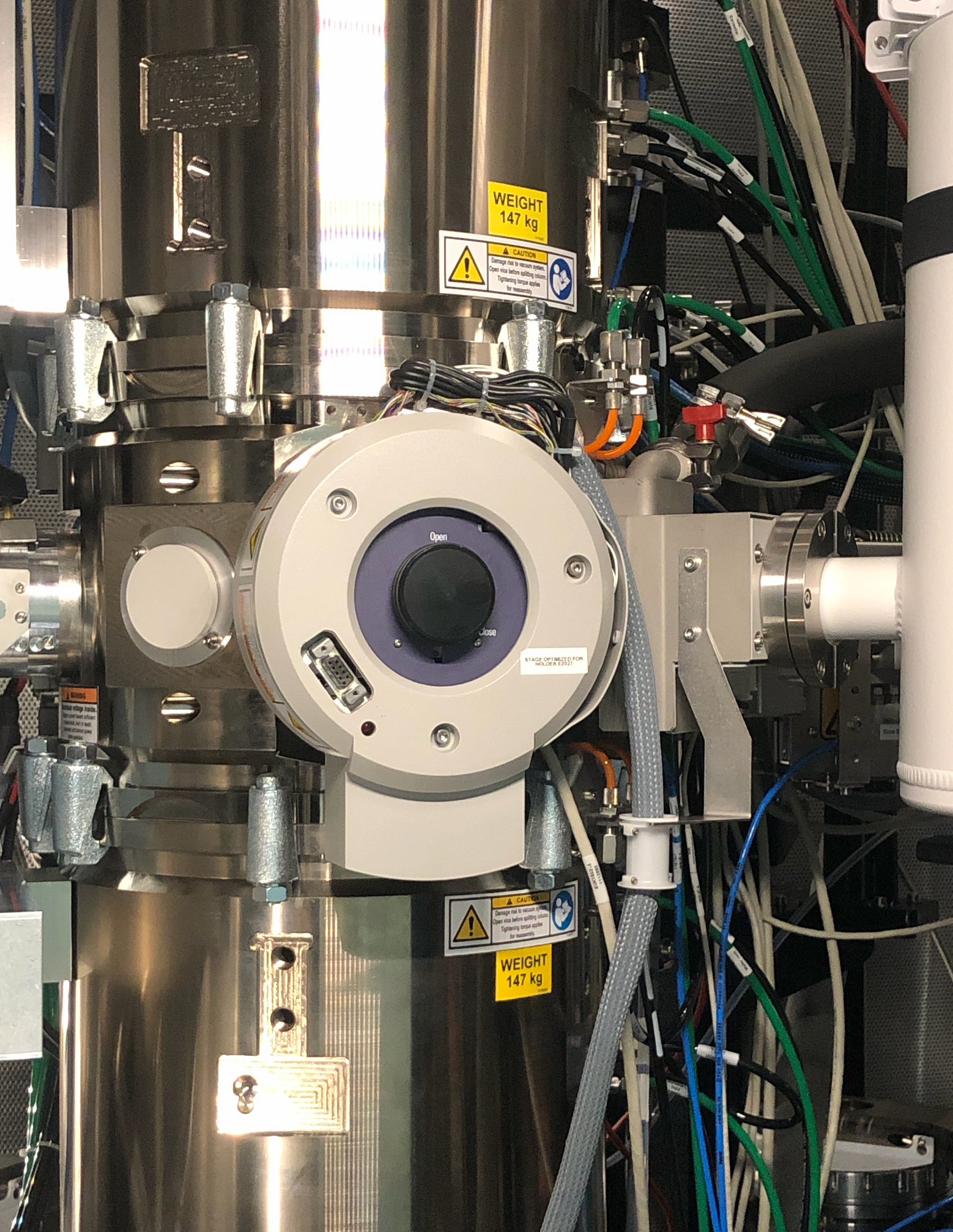 Rotating holder counter-clockwise and inserting