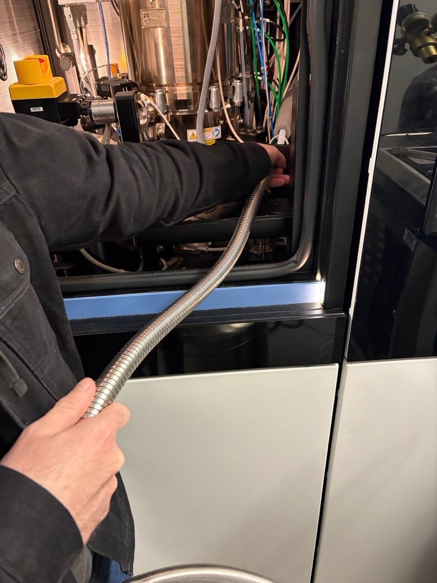 Inserting hose into the Spectra fill port
