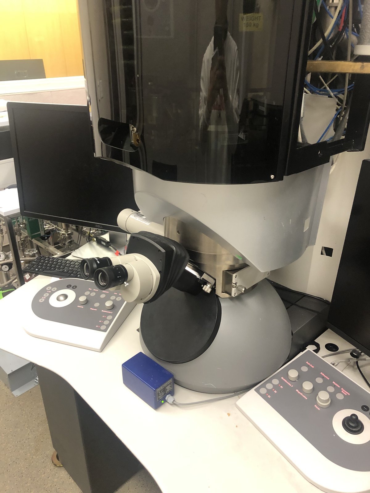 Titan workstation with binoculars, hand panel, and control panel