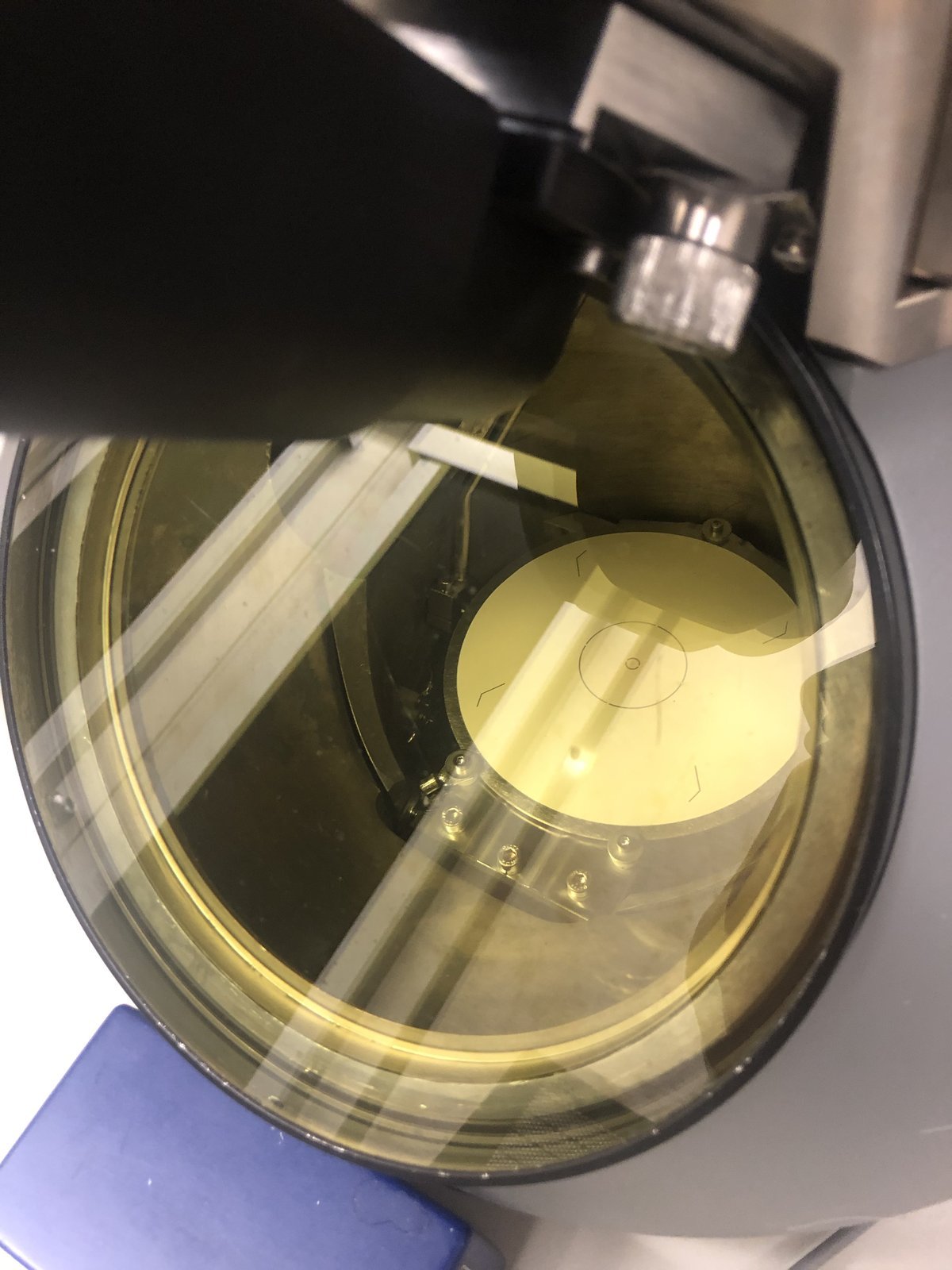 Fluorescent screen viewed through Titan viewing window